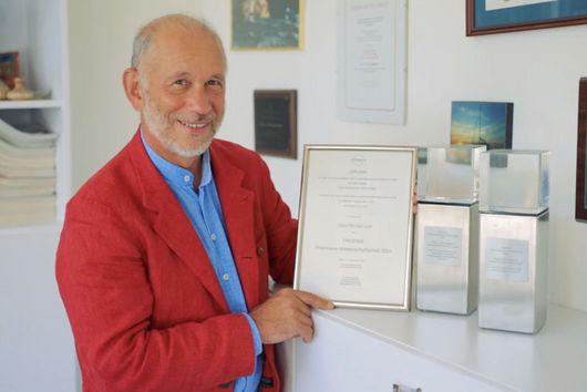 Portrait of Claus-Michael Lehr at his award ceremony