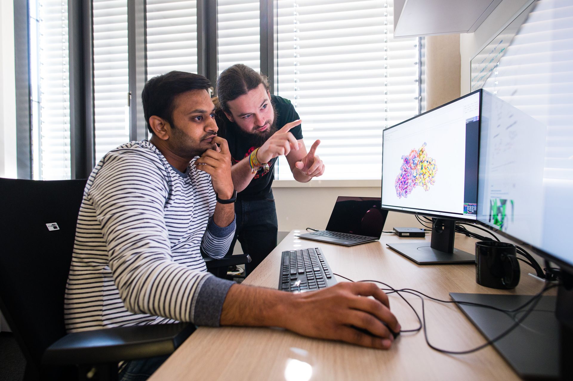 Two scientists in the office