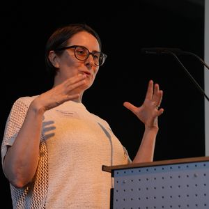 A Person behind a pedestal